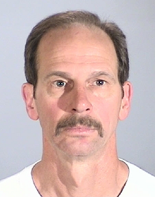 Torrance, California Police Department Booking Photo of El Segundo firefighter Michael Joseph Archambault, arrested on April 12, 2011 for shoplifting five products totaling $354.95 from Costco.